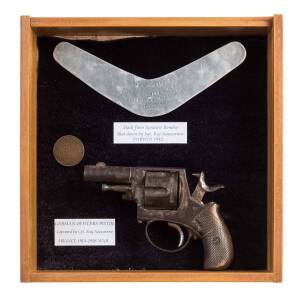 Darwin bombing souvenir, pistol and penny, comprising boomerang piece of metal engraved to Ken Nancarrow "Piece of Japanese plane brought down in Darwin 1942" with accompanying note "Made from Japanese bomber, shot down by Sgt. Reg Nancarrow, Darwin 1942"