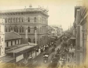 SYDNEY & NEW SOUTH WALES: A group of albumen photographs laid down on pages or card; various sizes. Subjects include Circular Quay, George Street, The Batteries - Entrance to Sydney Harbour, S.S.Kent in Sydney Harbour 1879, Zig-Zag Railway, Sydney Cathedr