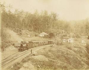 QUEENSLAND RAILWAY IMAGES by P.C. POULSEN: A group of 4 albumen paper prints (each 19.3 x 24cm) circa 1894; laid down on 2 cards: Toowoomba Range, Queensland - near Highfields; one in Highfields; one between Murphy's Creek & Highfields; and one Near Murph