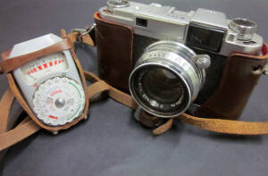 CAMERAS: Walz 35-S (583369) with light meter, Minox 35 GT with flash, Vintage Polaroid camera with flash and case.