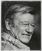 AUTOGRAPHS COLLECTION IN 3 ALBUMS, noted signed photos & letters (30+ items) mounted with press clippings, noted John Wayne, Groucho Marx, Ronald Reagan, Bette Davis, Mae West, Ginger Rogers (3), Buster Crabbe (3), Vera Lynn, Deborah Kerr, Mickey Rooney. - 3