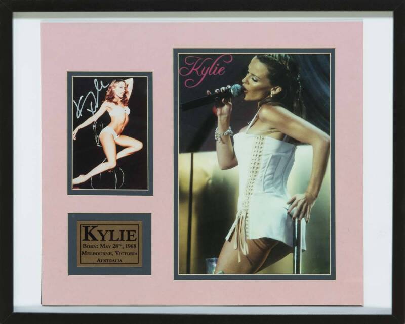 KYLIE MINOGUE, display with signed photograph, window mounted with action photograph of Kylie on stage, framed & glazed, overall 52x42cm. With CoA.