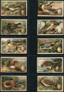 BIRDS & ANIMALS: 1912-59 collection in album, noted 1919 Gallaher "Birds, Nests & Eggs" [100]; 1927 Players "Game Birds and Wild Fowl" [50]; 1912 Wills "Fish of Australasia" [50]; 1929 Players "Curious Beaks" [50]. Mainly G/VG.