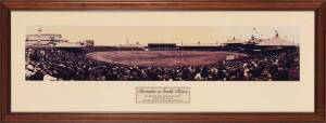 1931 AUSTRALIA v SOUTH AFRICA, 2nd Test at SCG, reprinted panoramic photograph showing Don Bradman & Keith Rigg batting (both scored centuries), window mounted, framed & glazed, overall 128x49cm.