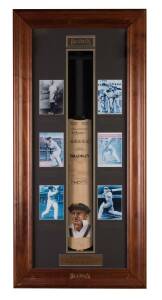 DON BRADMAN, attractive display comprising full size cricket bat with hand-painted portrait by Dave Thomas & signed by Don Bradman, mounted in display case together with 6 photos of Bradman, limited edition 193/334, overall 56x117cm.