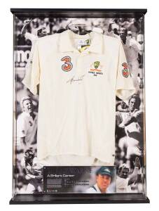 SHANE WARNE: "A Brilliant Career" display comprising signature on replica Test shirt, limited edition 220/250, mounted in attractive display case, overall 79x108cm. With CoA.