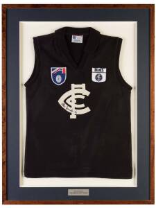 ALEX JESAULENKO (Carlton), signature on Carlton jumper, window mounted, framed & glazed, overall 72x95cm.