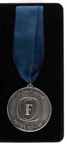 1987 VFL EXHIBITION MATCHES - "THE BATTLE OF BRITAIN": 11 Oct.1987 North Melbourne v Carlton in London. Runners Up Medallion in original case. [North Melbourne 16.8.104 d Carlton 13.13.91 in a brutal match at the Oval].