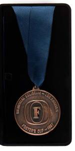 1987 VFL EXHIBITION MATCHES - FINAL: 18 Oct.1987 Melbourne v North Melbourne in Vancouver. Winners Medallion (engraved for Los Angeles Coliseum where match originally scheduled) in original case. [Melbourne 19.13.127 d North Melbourne 16.15.111].