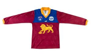 SHAUN HART'S BRISBANE LIONS JUMPER, match worn, long sleeves, with number "32" and signature on reverse. [Shaun Hart played 273 matches for Brisbane Bears & Brisbane Lions 1989-2004. He played in Brisbane's premierships 2001, 2002 & 2003, winning the Norm