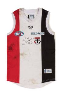 JUSTIN KOSCHITZKE'S ST.KILDA JUMPER, match worn in his 150th match v Richmond in 2010, with number "23" on reverse & signature on front. With StKilda FC CoA. [Justin Koschitzke played 200 matches for St.Kilda 2001-2013, winning the AFL Rising Star in 2001