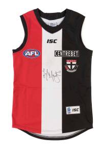 LEIGH MONTAGNA'S ST.KILDA JUMPER, match worn in 2012 season, with number "11" on reverse & signatures on front & reverse. [Leigh Montagna has played 271+ matches for St.Kilda since 2002].