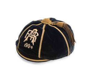 1904 AUCKLAND RUGBY HONOUR CAP, deep blue velvet, embroidered "AFR 1904", (possibly Auckland Football Representative), made by "J.A.Cooper, Auckland". Good condition.