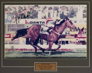 SUNLINE, action photograph signed by jockey Greg Childs, window mounted, framed & glazed, overall 84x70cm.