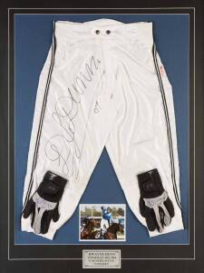 DWAYNE DUNN, display "Dwayne Dunn, Winner of the 2007 Caulfield Cup, Tawqeet", with race worn riding pants & pair of riding gloves, all signed, window mounted, framed & glazed, overall 83x109cm.