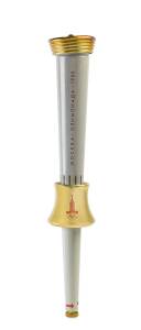 1980 MOSCOW OLYMPIC TORCH, aluminium alloy, 56cm tall, designed by Boris Tuchin, legend at top in cryllic, "MOCKBA - OLYMPYADA - 1980", the handle is grey with a gold plated upper guard imprinted with the emblem of the Games. Runners carried the torch dur