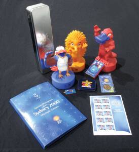 2000 SYDNEY OLYMPICS, group with various stamps & FDCs; programmes (3); tickets (4); mascot money boxes (3); souvenirs; playing cards; polo shirt; signed items (6); gold medallist covers (10); newspapers in 2 albums; also Melbourne 2006 Closing Ceremony B