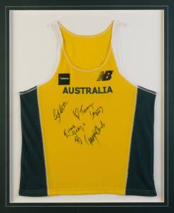 SYDNEY 2000, display with Australian singlet with 4 signatures including Emma George & Tamsyn Lewis, framed & glazed, overall 83x98cm.