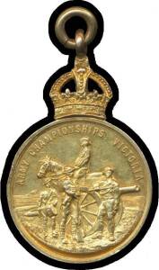 AUSTRALIA: 1913 15ct Gold medal, (22.65g 30mm) crown with suspension ring above 'ARMY CHAMPIONSHIPS VICTORIA' surrounding mounted soldier and artillery, ship in background, rev. engraved '100 Yards Race / 1896-97 Quota / Senior Cadets / First / CADET SPEN