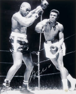 MUHAMMAD ALI, signed photograph from the Muhammad Ali vs Doug Jones fight, March 13th 1963, size 40x51cm. With 'Online Authentics' No.9612.