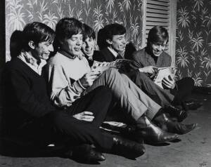 THE ROLLING STONES: Dezo Hoffman photograph showing the Rolling Stones in their new London office in September 1963, limited edition 1/500, window mounted, framed & glazed, overall 69x61cm.
