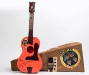 THE BEATLES: "Beatles New Beat Guitar", toy guitar made by Selcol, 80cm long in original box. Only two strings, but with booklet "Beatles Guitar Instruction and Song Chart".