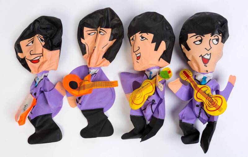 THE BEATLES: Complete set of 4 Beatles cartoon character inflatable dolls (1966).