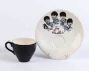 THE BEATLES: Group with Washington Pottery "The Beatles" cup & saucer; "Beatlemania Sweeps Australia" scarf; b/w stills (3) from "A Hard day's Night". (6 items). - 3