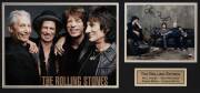 THE ROLLING STONES, display with photograph signed by Mick Jagger, Keith Richards, Ronnie Wood & Charlie Watts, window mounted, framed & glazed, overall 84x46cm. With CoA.