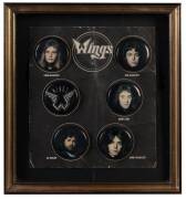 WINGS: Set of 6 badges - Paul McCartney, Linda McCartney, Denny Laine, Joe English, Jimmy McCulloch & Wings. Only available to the members of the Wings Over the World tour 1975-76. ex Howie Casey, leader of the brass section, with his "Wings" security pas - 4