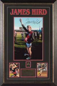 JAMES HIRD: Signed photograph, window mounted with replica Brownlow Medal & two action photos, framed & glazed, overall 59x89cm. With CoA.