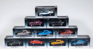 AUTO ART: 1:43 Group of Ford Falcon Model Cars Including Ford Falcon XY GTHO Yellow Ochre (52710); And, Ford Falcon XC Cobra option ’97 white/blue (52752); And, Ford Falcon XY GTHO Bronze Wine (52700); All mint in original cardboard and plastic display ca