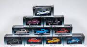 AUTO ART: 1:43 Group of Ford Falcon Model Cars Including Ford Falcon XY GTHO Yellow Ochre (52710); And, Ford Falcon XC Cobra option &rsquo;97 white/blue (52752); And, Ford Falcon XY GTHO Bronze Wine (52700); All mint in original cardboard and plastic display ca