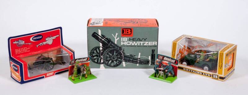 BRITAINS: Group of Model Cars and Militaria Including 18’’ Heavy Howitzer (9740); And, US Jeep (9786); And, B.A.T Gun (9720). Most mint in original cardboard packaging. (15 items)