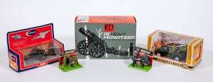 BRITAINS: Group of Model Cars and Militaria Including 18’’ Heavy Howitzer (9740); And, US Jeep (9786); And, B.A.T Gun (9720). Most mint in original cardboard packaging. (15 items)