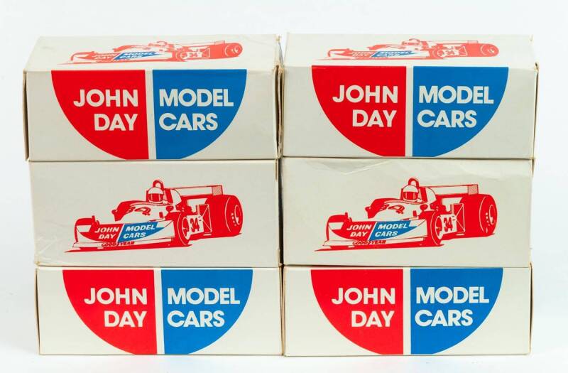 JOHN DAY: 1:43 Group of White Metal Model Car Hobby Kits Including Kit E2034; And, Kit E2033; And, Kit E2026. All mint and unbuilt in original cardboard packaging. (12 items)