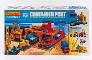 MATCHBOX: Vintage 1970s Container Port with Playmat Playset (PS-1) Comprising of 1 Container Truck, 2 Fork Lifts, 1 locomotive, 3 Flat Cars, 6 Plastic Containers, 6 Cardboard Containers, 1 Ship, 1 Straddle Carrier, 1 Giant Crane, and 1 Crane and Base with