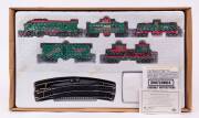 MATCHBOX: HO Scale Holiday Express Train Set, The Set Included One Electric Train, Four Cars, Tracks and a Transformer. Mint in original packaging.&nbsp;