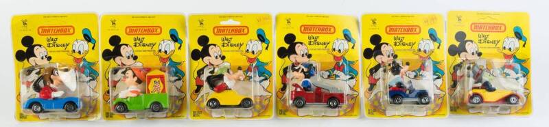 MATCHBOX: Group of Disney Superfast Model Cars Including Goofy (WD-3); And, Mickey (WD-1); And, Donald (WD-2). All mint and unopened on original cardboard card. (7 items)