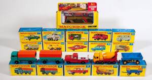 MATCHBOX: Group of 1960s Lesney Era 1-75 F Style Model Cars and Accessory Including Service Ramp (A-1); And, Ford Refuse Truck (7); And, Safari Land Rover (12). All mint in original cardboard packaging. (80 items approx.)