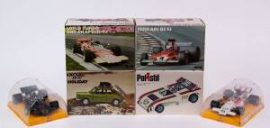 POLISTIL: 1:25 Group of Model Cars Including Ferrari B3 F.1 (FX 7); And, Lotus Turbo Indianapolis F.1 (FX6); And, Lola L & M 260 Can AM (S10). All Mint in original packaging. (19 items)