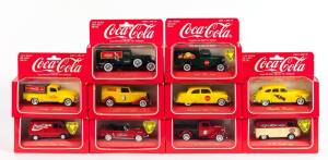 SOLIDO: 1:43 Group of 'Coca Cola' Model Cars Including 1964 Ford Mustang; And, 1936 Ford V8 Plateau; And, 1966 V.W. Combie 1966. All mint in original cardboard packaging. (17 items)