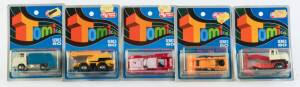 TOMICA: Group of Blister Pack Model Cars Including Tadano Rough Terrain Crain (2); And, IZUZU Elf (35); And, Yutani Shovel TY45 (51). All mint in original cardboard packaging. (110 items approx)