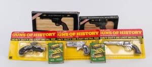 Group of Minatare Guns and Accessories Including UNIVERSAL: Guns of History Derringer; And, ARM MODELLI:  Tipo Colt Frontier; And, JET Gun Caps. Most mint in original cardboard packaging. (9 items)