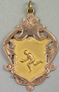 CARLTON: 9ct gold fob/medal with Footballer on front, engraved on reverse "Carlton F.C., 2nd 18, Best All Round Player Season 1928, J.Crowe". Weight 5.69 grams. Ex James Crowe, who played 83 games for Carlton 1929-34, and 21 games for Collingwood 1936-37.