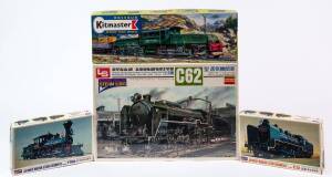 Group of Locomotive Hobby Kits Including LS: C62 Steam Locomotive with Tender, Passenger Coach and 3100mm Track (UM3); And, KITMASTER: Giant Swiss Crocodile (12); And, CROWN: C51 Japanese Modern Steam Locomotive. All mint and unbuilt in original cardboard