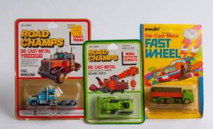 Group of Miscellaneous Group of Model Car Blister Packs Including ROADCHAMPS: Kenworth Truck; And, PLAYART: ‘Fast Wheels’ Chevrolet Astro (7121); And, ROADCHAMPS: Construction Vehicle. All mint and unopened on original cardboard cards.