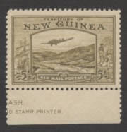 New Guinea: 1939 (SG.223) 5/- Bulolo Goldfields Airmail, superb MVLH marginal single with part imprint. Cat.€190.