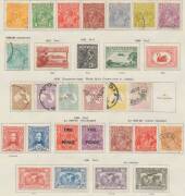 Australia: Pages from Gibbons "New Ideal Postage Stamp Album" with Kangaroos including First Wmk 2d unmounted, 5/- fine used with exceptional centring, and CTO 2d 6d & &Acirc;&pound;1, Third Wmk &Acirc;&pound;1 brown & blue and &Acirc;&pound;1 grey, SMult Wmk complete set & CofA Wmk complet - 4