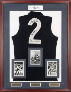 CARLTON: "Number 2 Jumper" display comprising Carlton jumper signed on the number by John Nicholls, Peter Motley & Greg Williams, limited edition 14/222, window mounted with action photo of each player, framed & glazed, overall 89x109cm. With framed CoA.